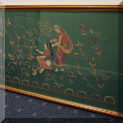 A06. Framed Indian embroidered green background tapestry. 24”x42” - $75
